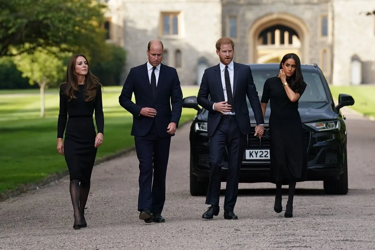 Kate Middleton, Prince William, Prince Harry and Meghan Markle during the long walk to mourners gathered outside Windsor Castle