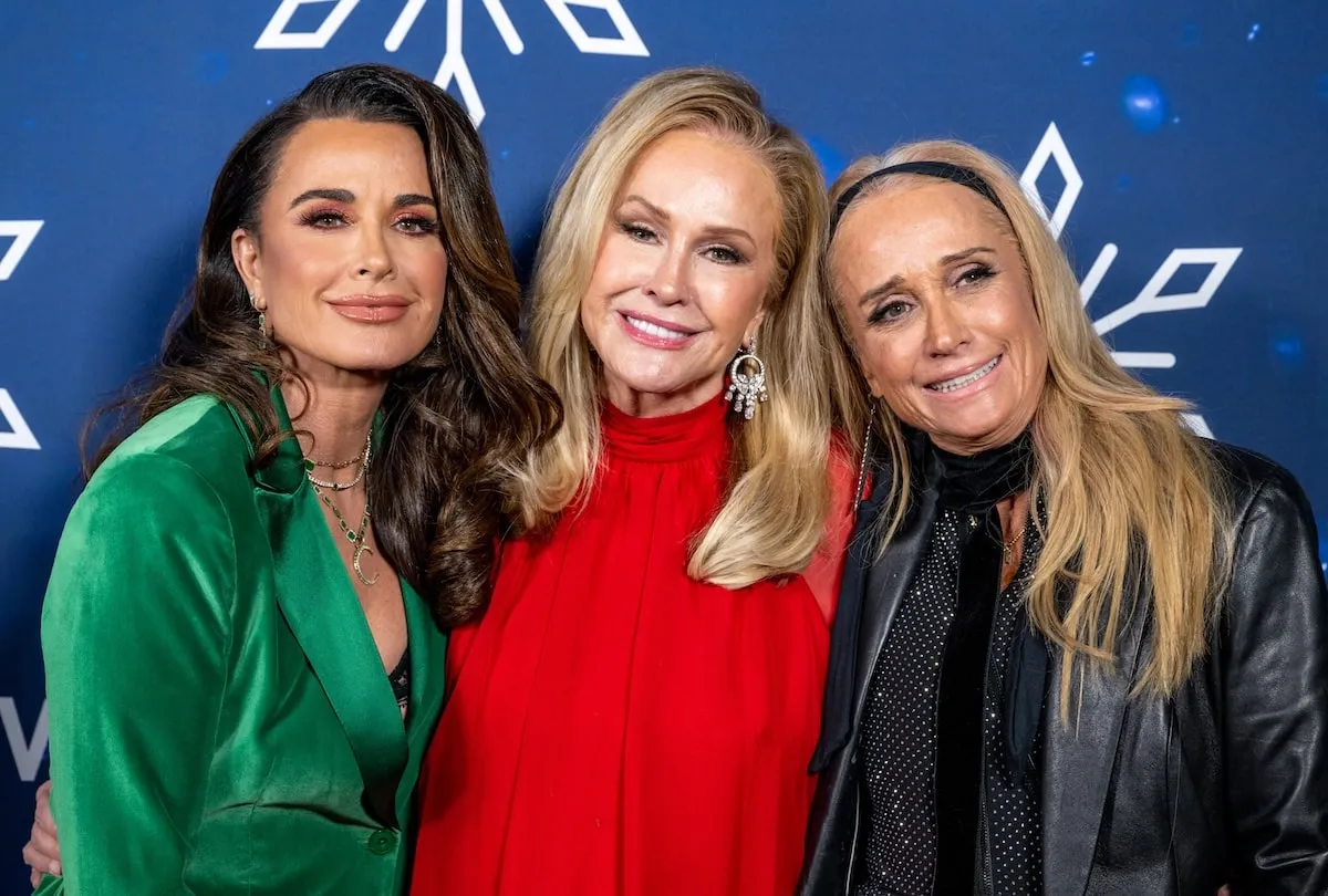 Sisters Kyle Richards, Kathy Hilton, and Kim Richards pose for a photo at a Christmas event in 2023