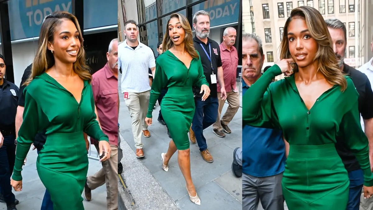 Model/actor Lori harvey wears a silk green top and dress as she walks past paparazzi in NYC