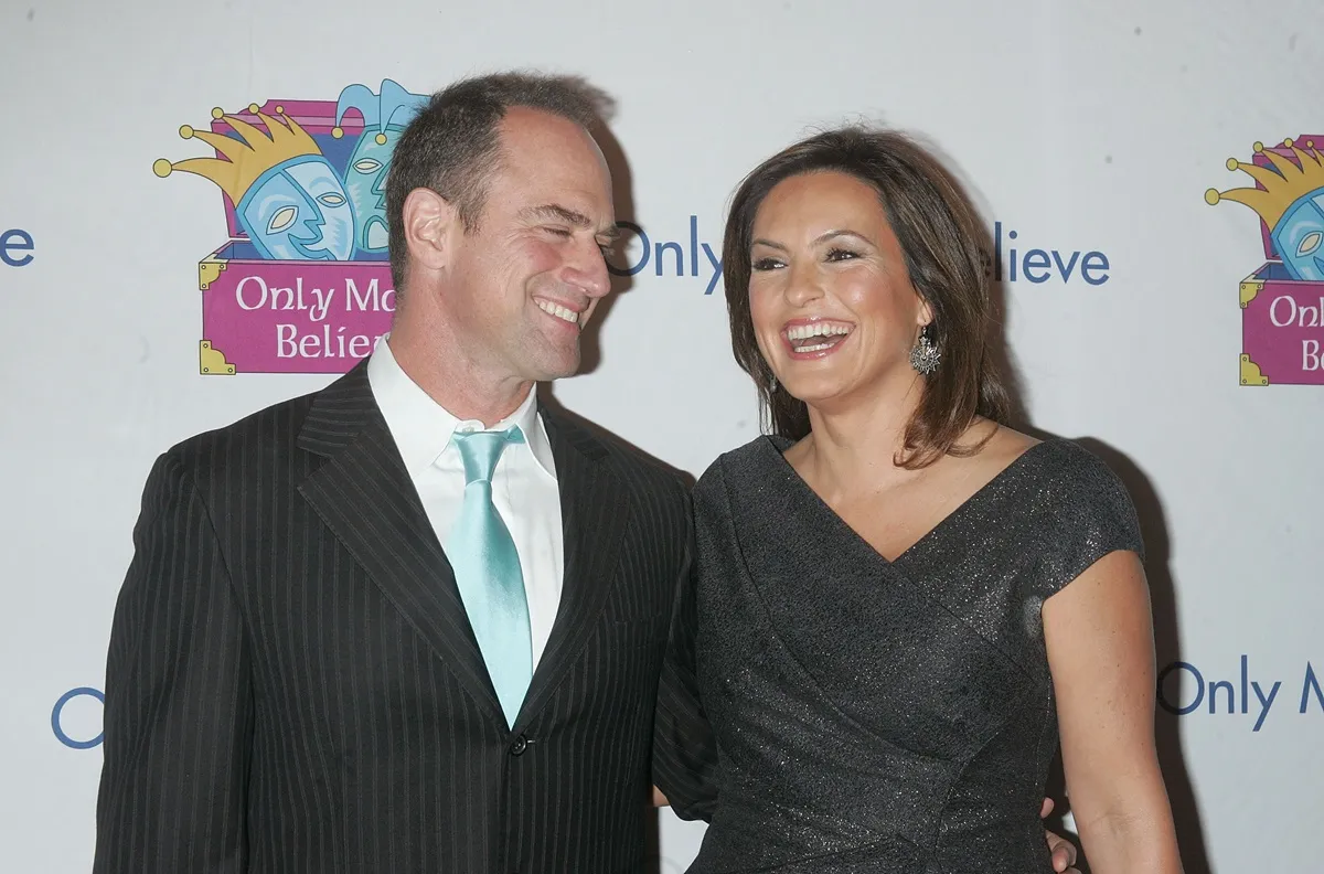 Mariska Hargitay and Chris Meloni attend the 12th Annual Make Believe on Broadway gala wearing a dress and suit.