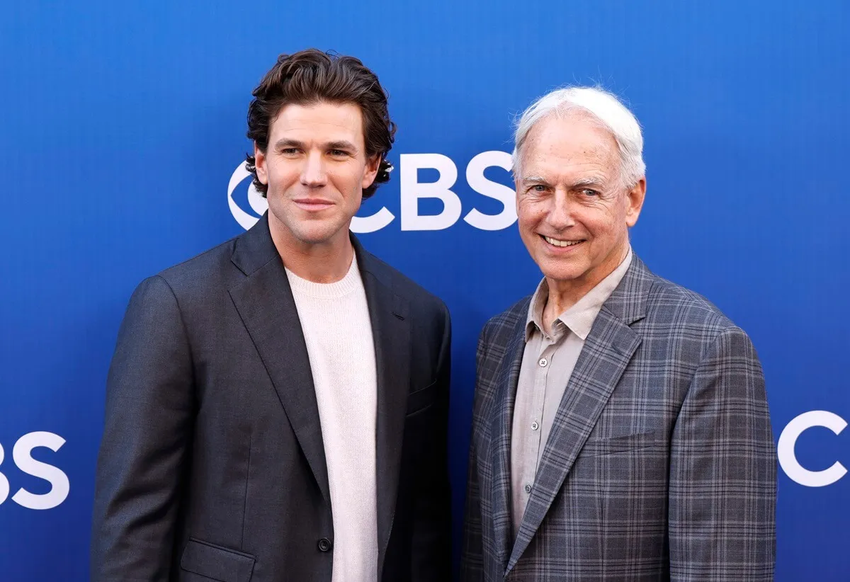 Mark Harmon posing alongside Austin Stowell at the CBS Fall Schedule Celebration at Paramount Studios.