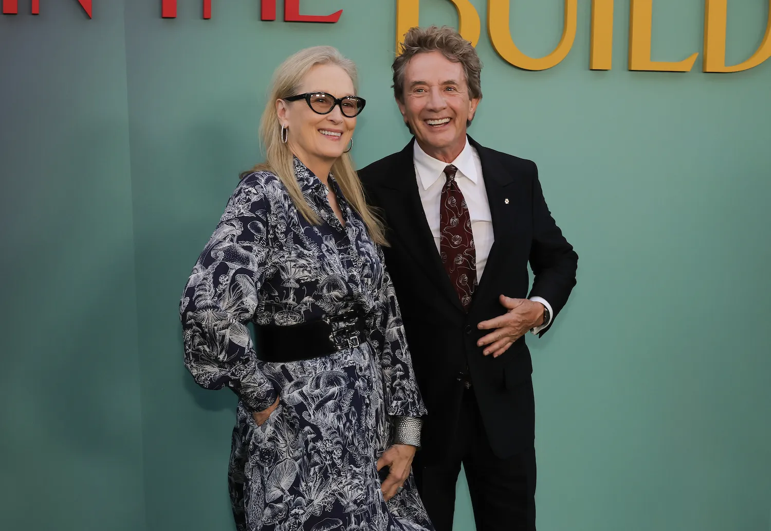 Meryl Streep and Martin Short with their arms around each other and smiling at Hulu's 'Only Murders in the Building' premiere