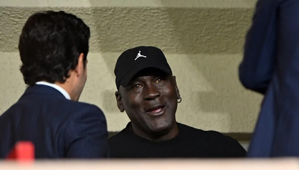 Michael Jordan is seen in the stands prior to the UEFA Champions League match between AS Monaco and FC Barcelona