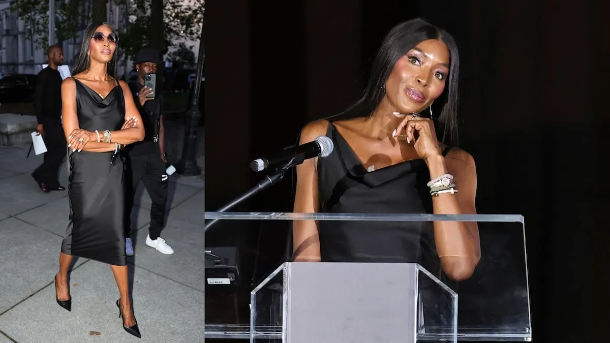 Wearing a black satin dress, Naomi Campbell speaks during the Fashion Show & Style Awards in Harlem