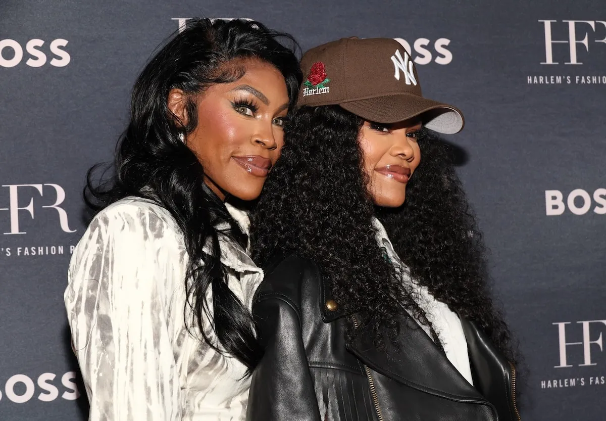 Mother Nikki Taylor and daughter Teyana Taylor squeeze together and pose for a photo at Harlem Style Awards