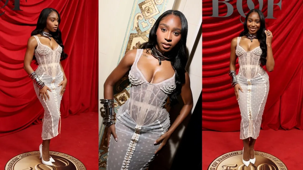 Wearing a sheer pink corset dress, Normani poses for photos before the Business of Fashion BoF 500 Class of 2024 event at Paris Fashion Week 2024