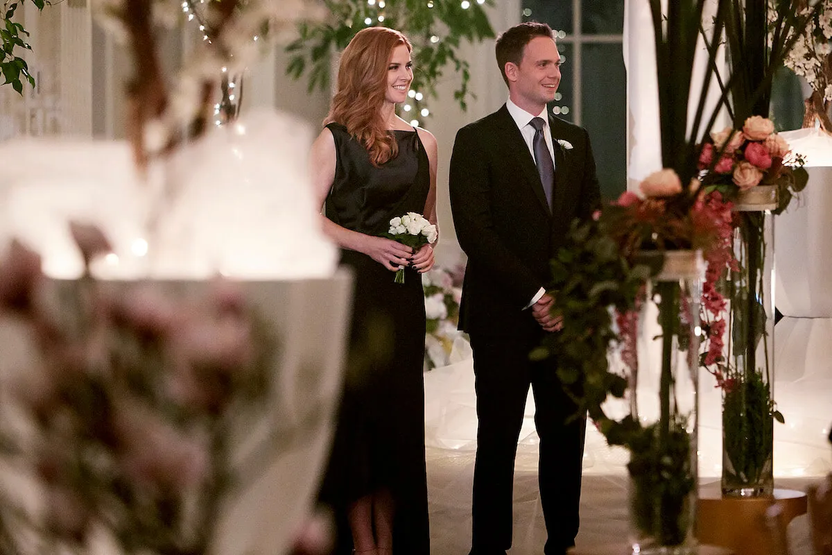 Patrick J. Adams, who didn't watch 'Suits' due to 'insecurities,' with Sarah Rafferty on the show