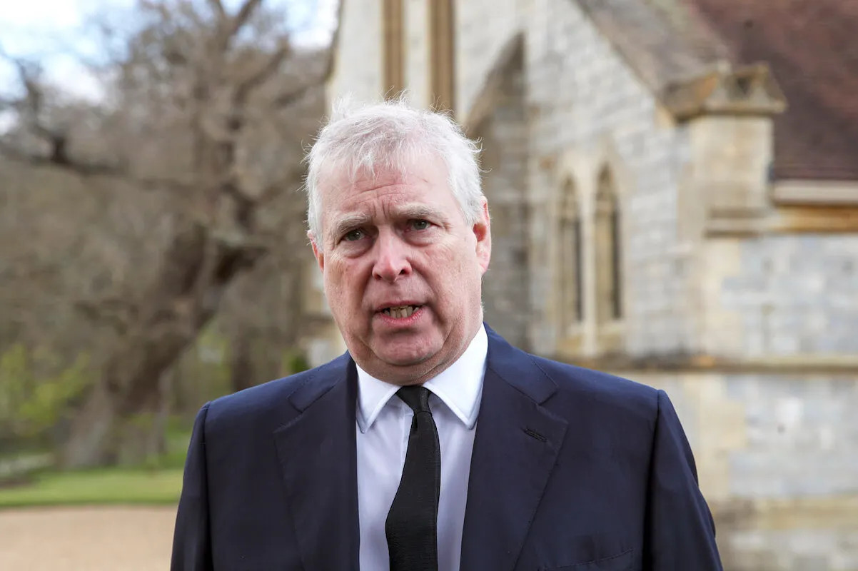 Prince Andrew, for whom the Royal Lodge is expected to get 'cold and uncomfortable' in 2021, wears a suit and tie.