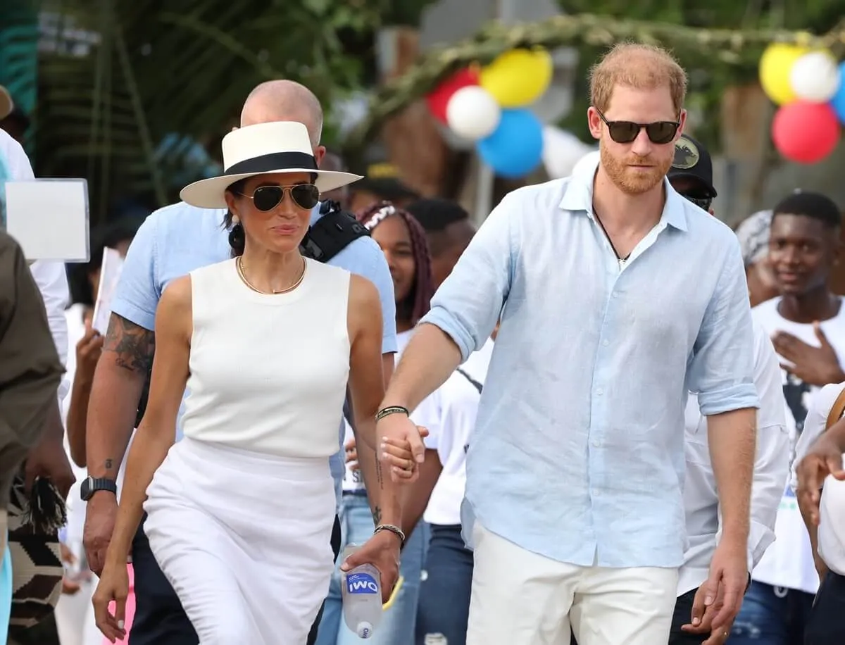 Prince Harry and Meghan Markle are seen in the streets of San Basilio de Palenque during a visit around Colombia