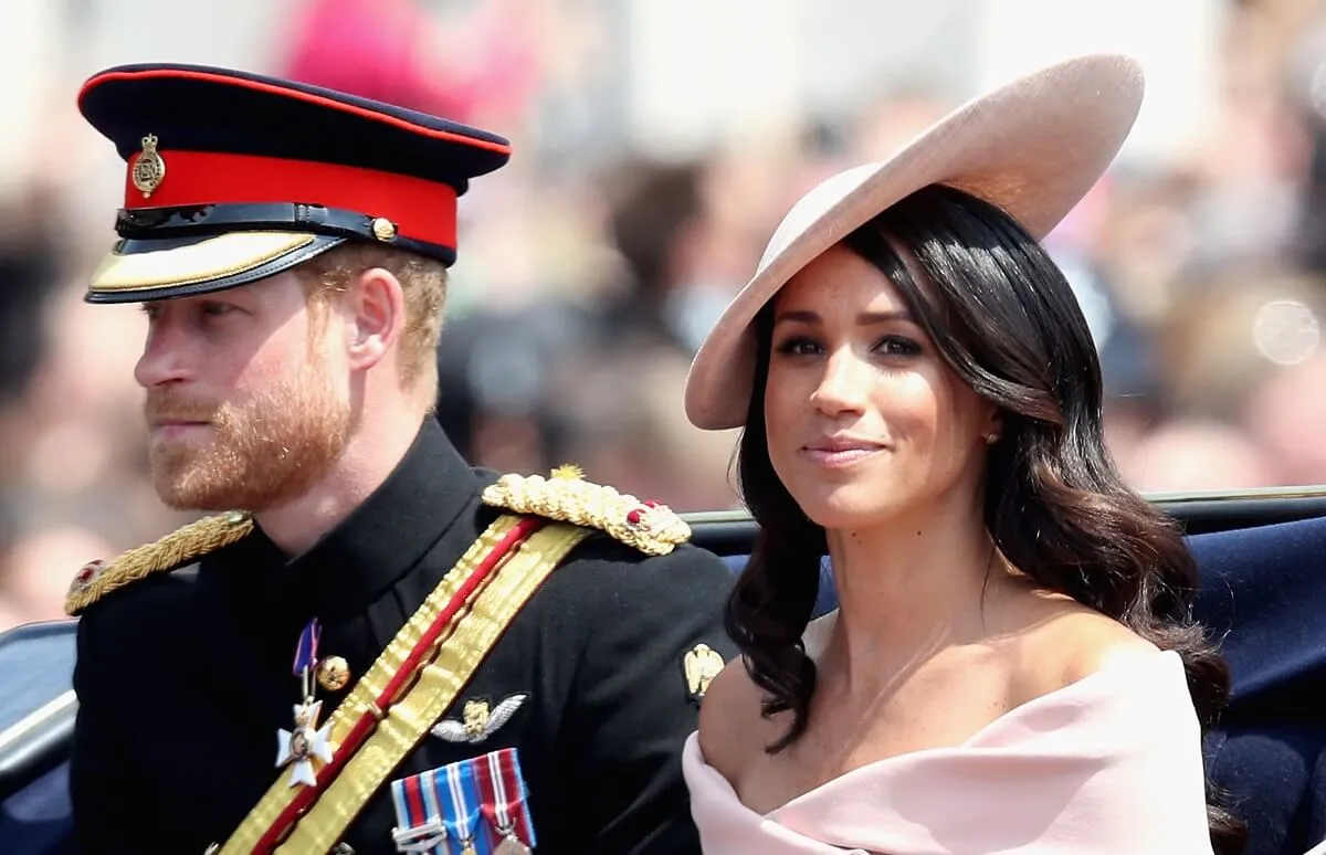 Prince Harry and Meghan Markle on the Mall during Trooping The Colour