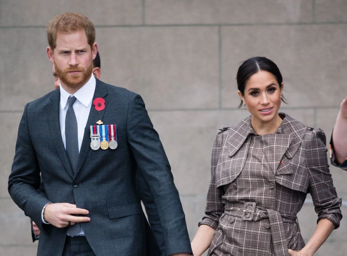 Prince Harry and Meghan Markle visit the National War Memorial in Wellington, New Zealand