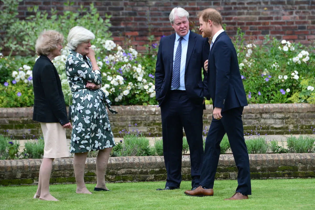 Prince Harry and Princess Diana's siblings, Sarah, Jane, and Charles, stand together. 