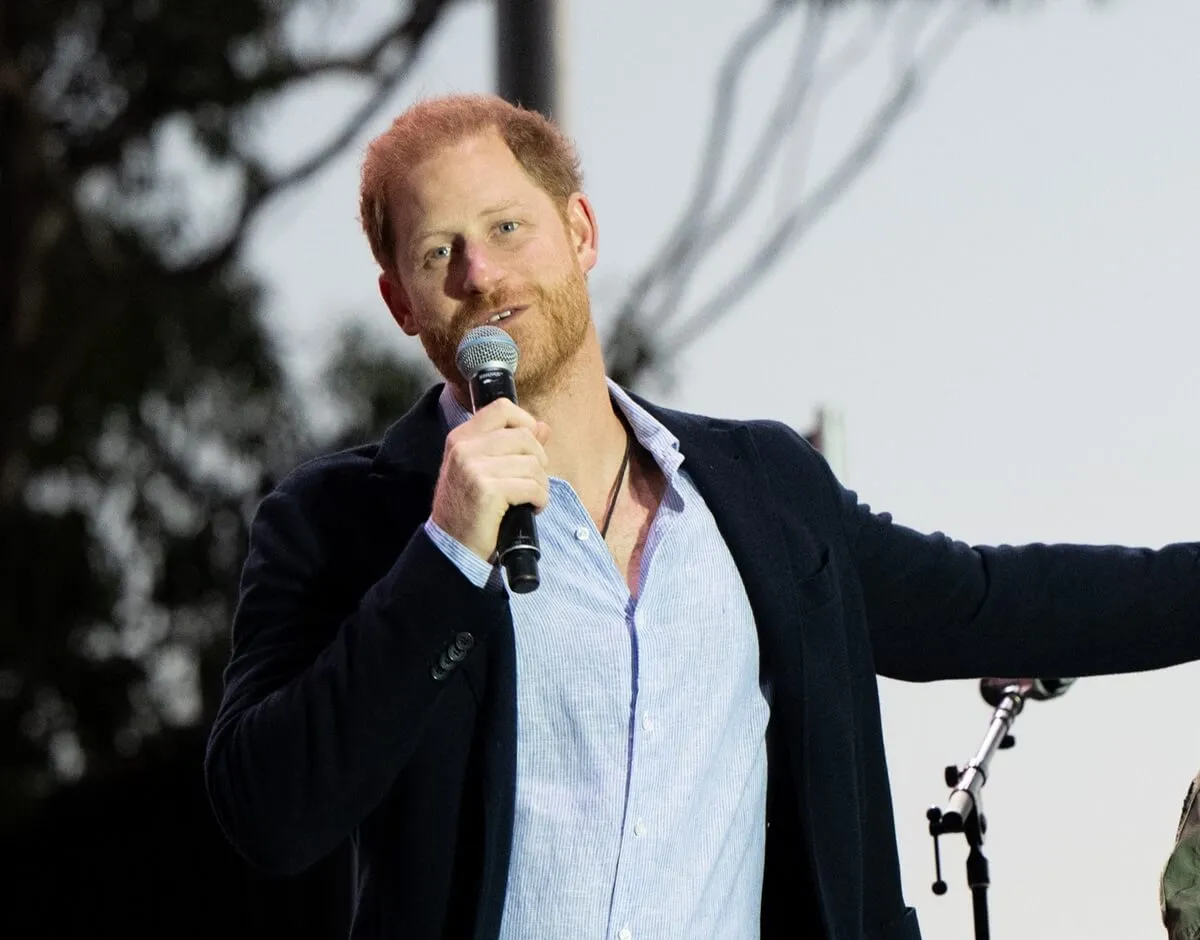 Prince Harry presents an award to Santa Barbara County Air Support Pilot Loren Courtney during the One805Live Fall Concert