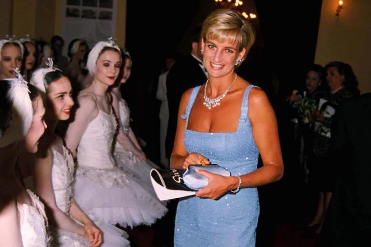 Princess Diana, who Kate Middleton got compared to after her cancer update video, in the '90s wearing a blue dress. 