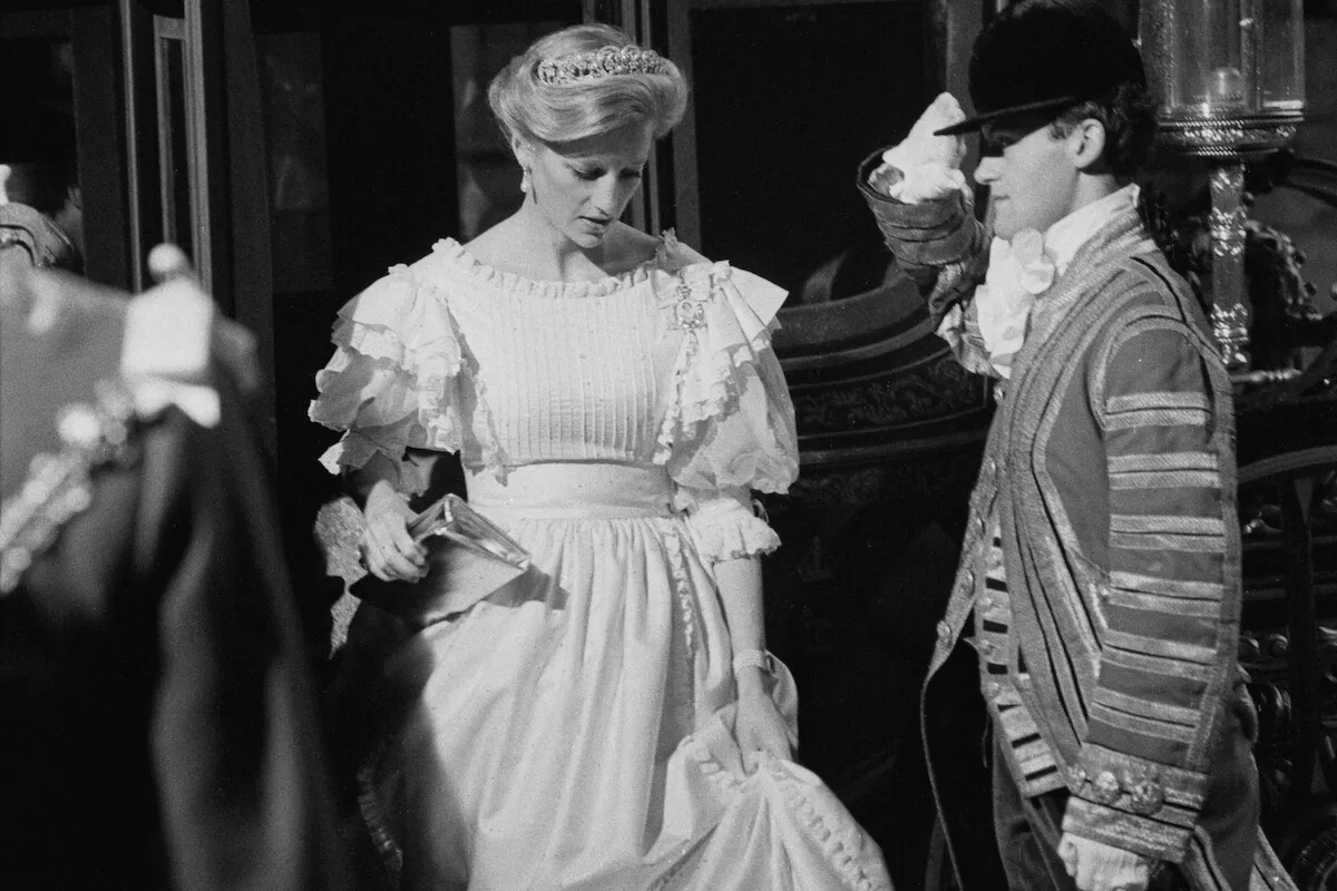 Princess Diana, whose updo upset Queen Elizabeth II, steps out of a carriage.