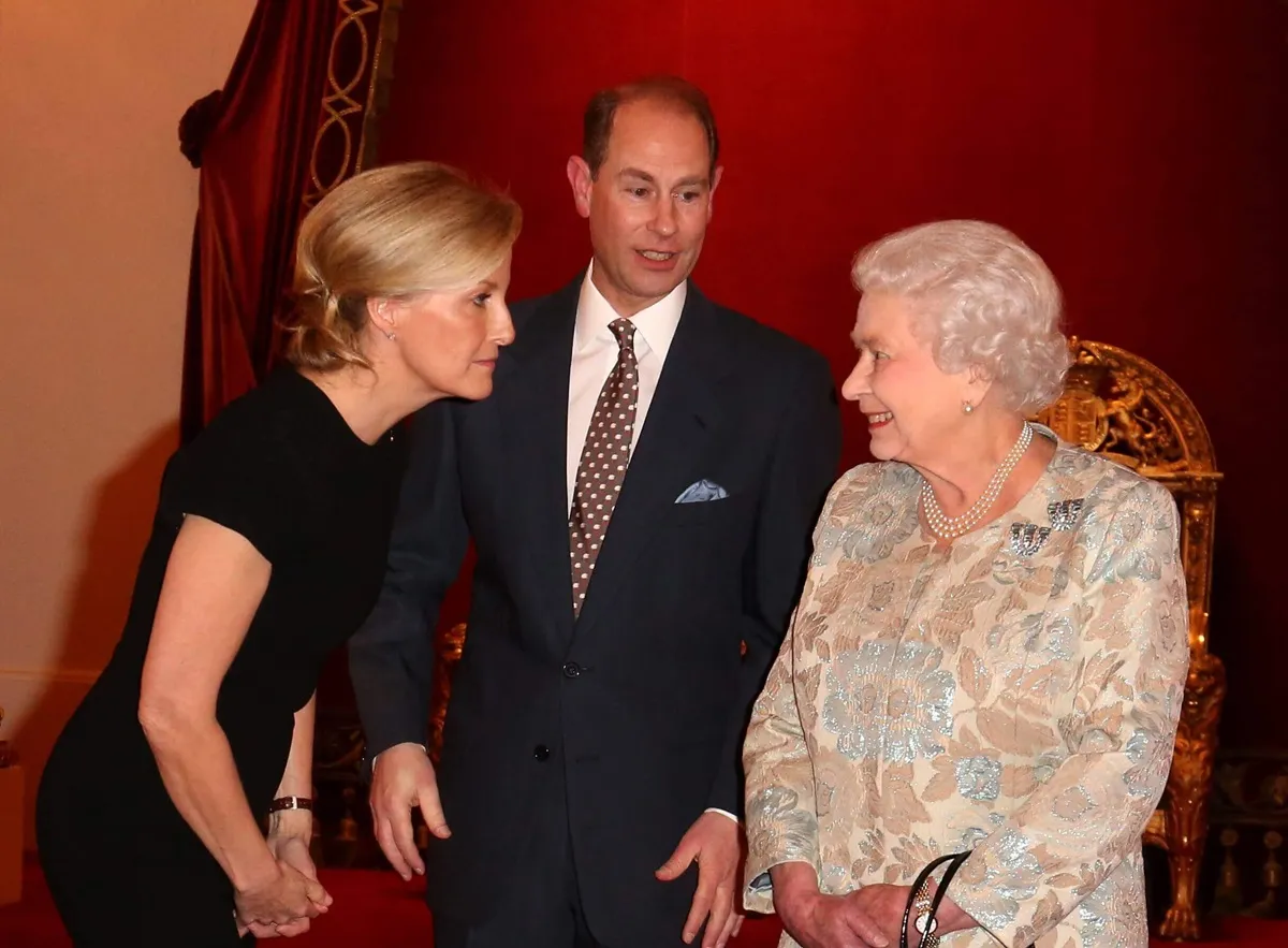 Queen Elizabeth II with Sophie and Prince Edward during a reception to celebrate the patronages at Buckingham Palace