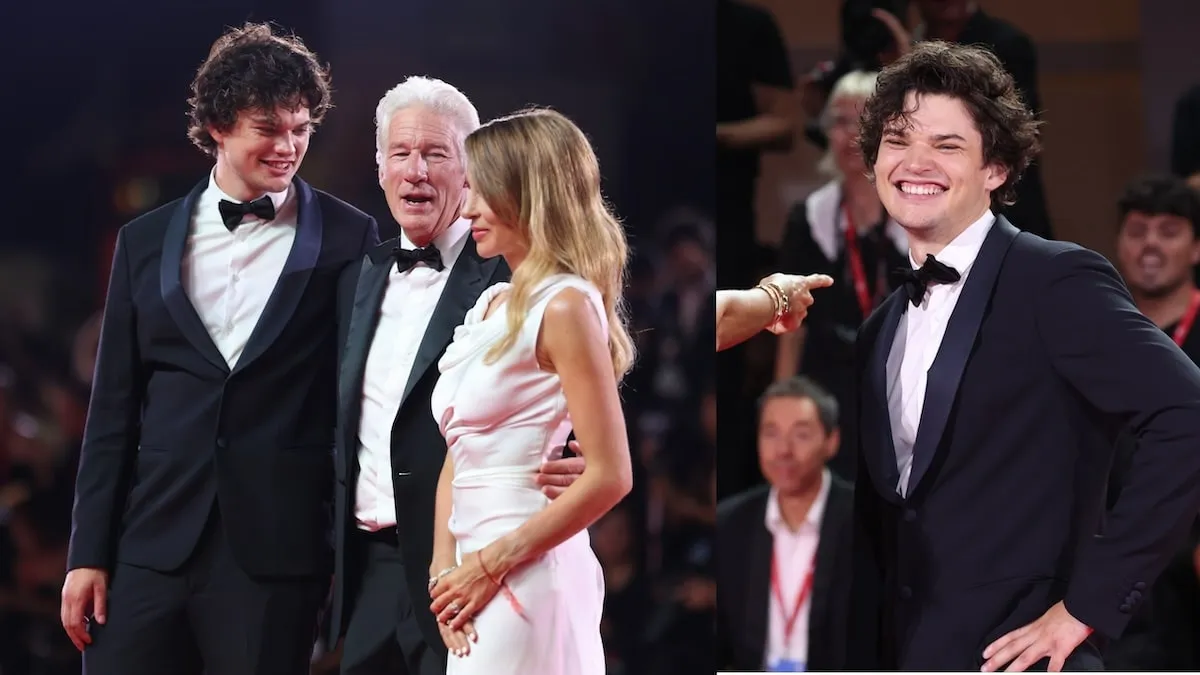 Wearing a tuxedo, Richard Gere stands with his son Homer and wife Alejandra Silva on the red carpet at the Filming Italy Venice Award show