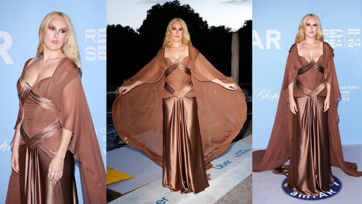 Wearing a bronze draped dress, Rumer Willis poses for the cameras on the red carpet at the amfAR Gala Venezia 2024