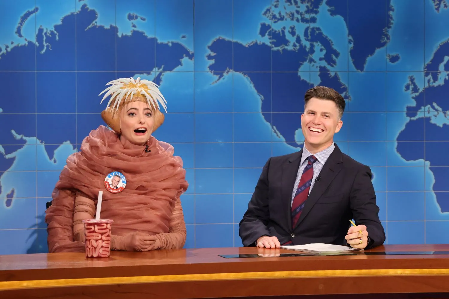 'Saturday Night Live' cast members Sarah Sherman and Colin Jost in a 'Weekend Update' sketch.