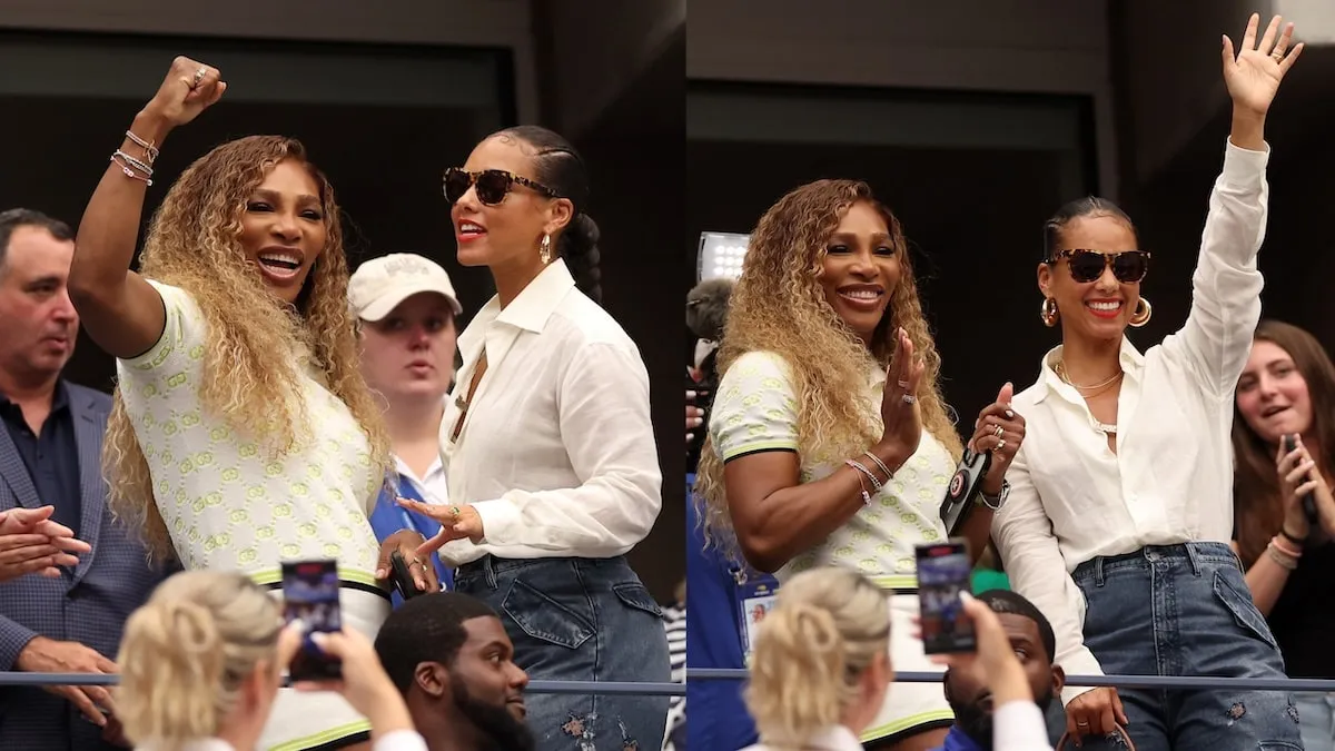 Alicia Keys and Serena Williams stand up next to their seats inside Flushing Meadows and cheer during the U.S. Open