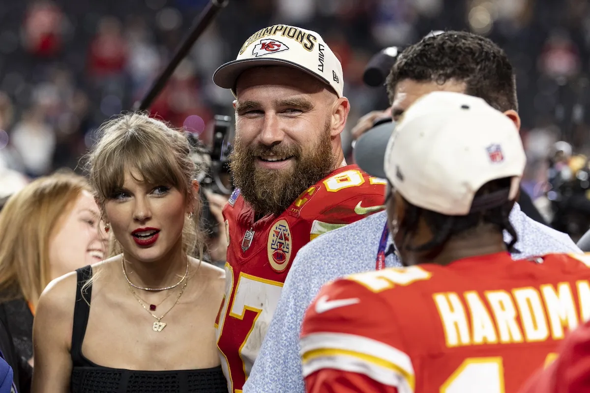 Taylor Swift standing next to Travis Kelce after his 2024 Super Bowl win