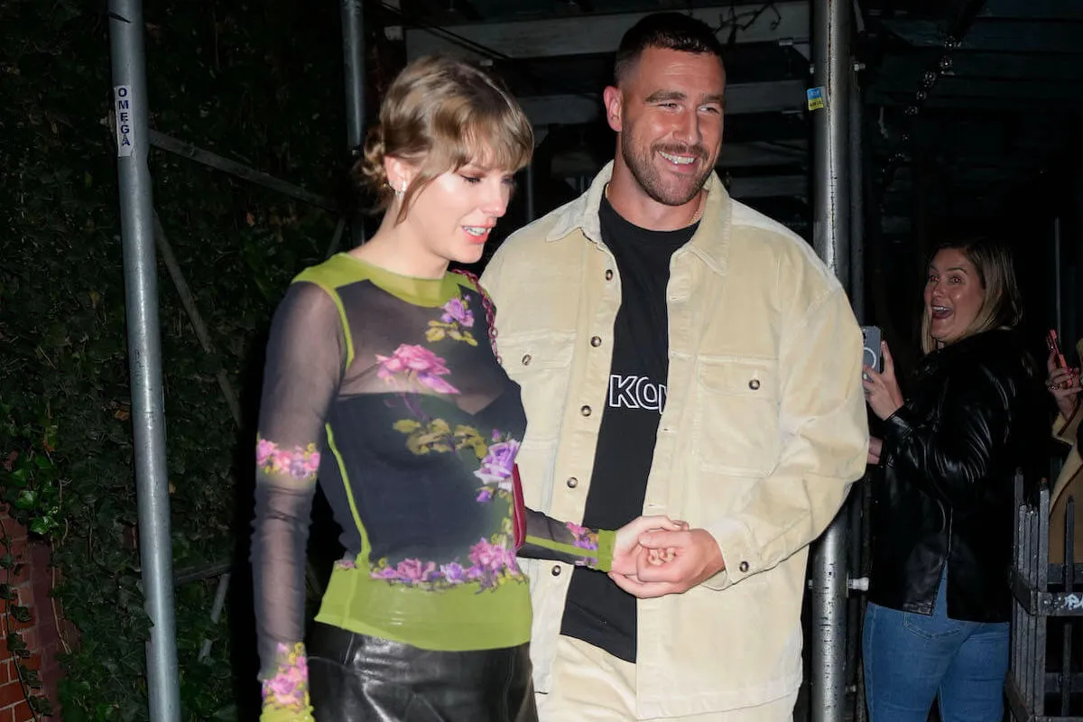 Taylor Swift and Travis Kelce, who brings a 'first' to relationships for Swift, in 2023