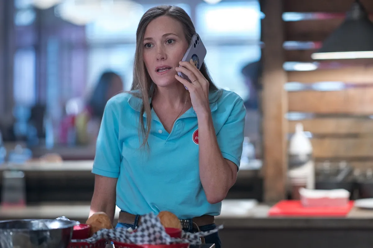 Schuyler Fisk talking on the phone in 'The Chicken Sisters' on Hallmark+