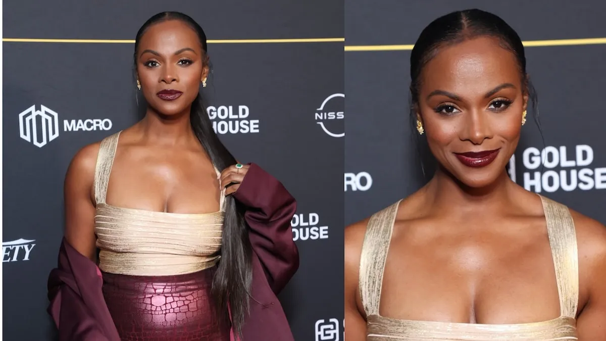 Wearing a gold top and maroon skirt, Tika Sumpter poses for photos at an Emmy party in 2024