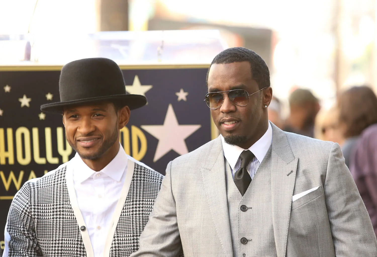 Usher and Sean 'P. Diddy' Combs dressed up on the Hollywood Walk of Fame in 2013