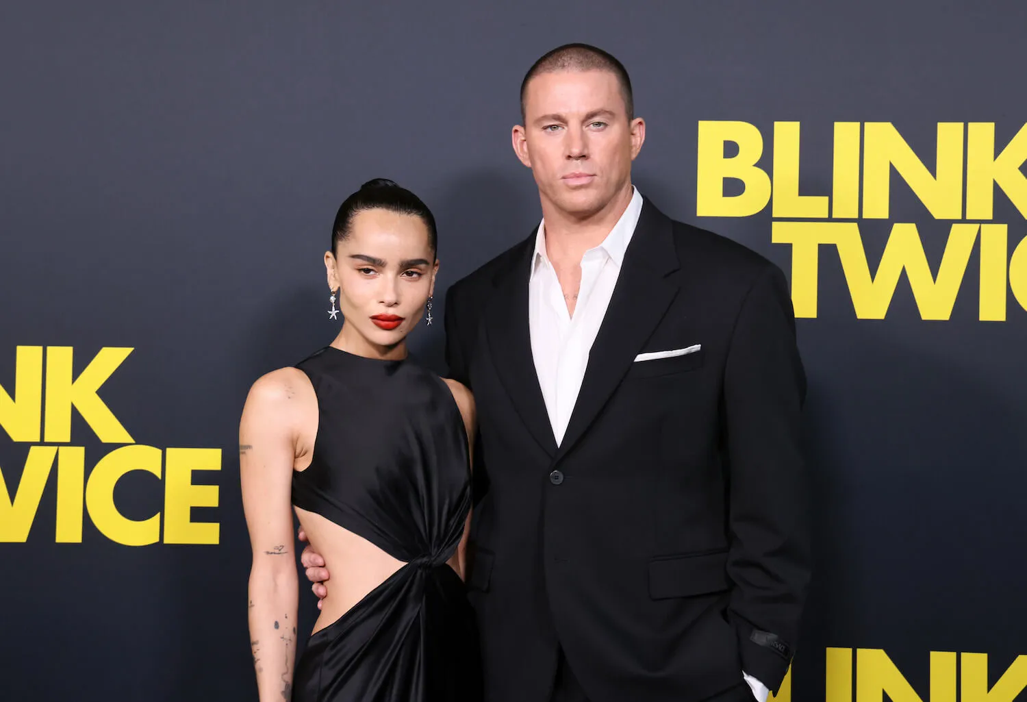 Zoë Kravitz and Channing Tatum standing next to each other with their arms around each other at the 'Blink Twice' premiere