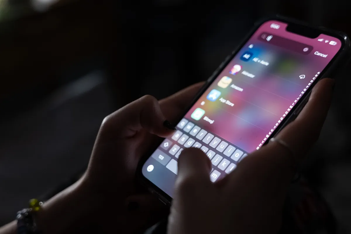 A teenager uses her iPhone to access social media on January 31, 2024 in New York City.