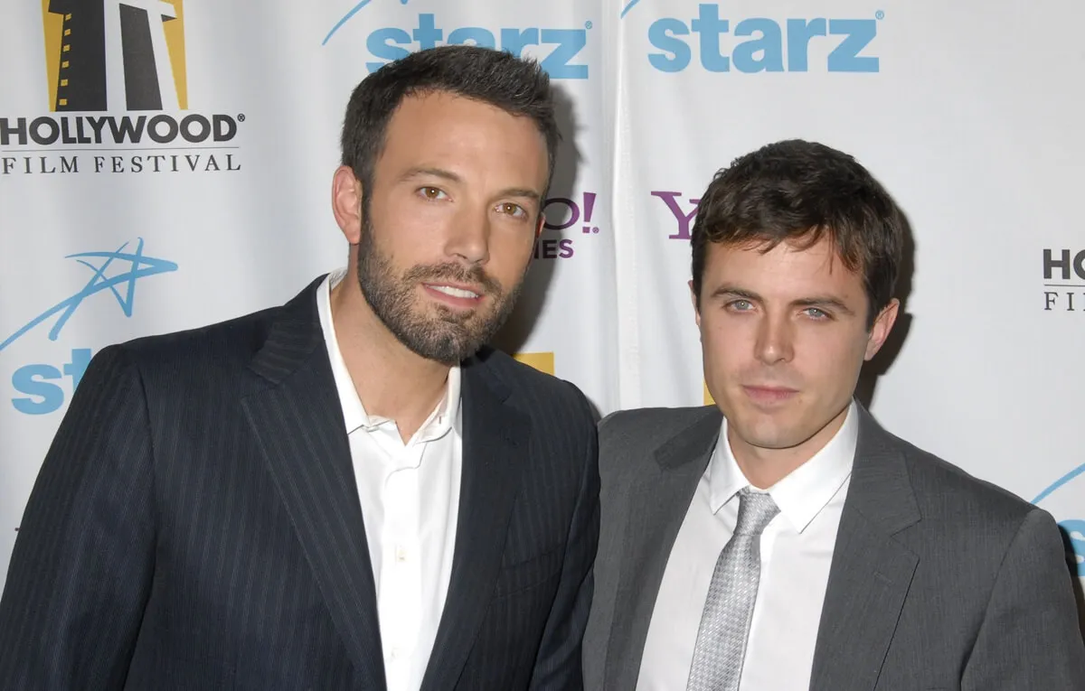 Ben Affleck and Casey Affleck arrive to Hollywood Film Festival's Hollywood Awards wearing suits.