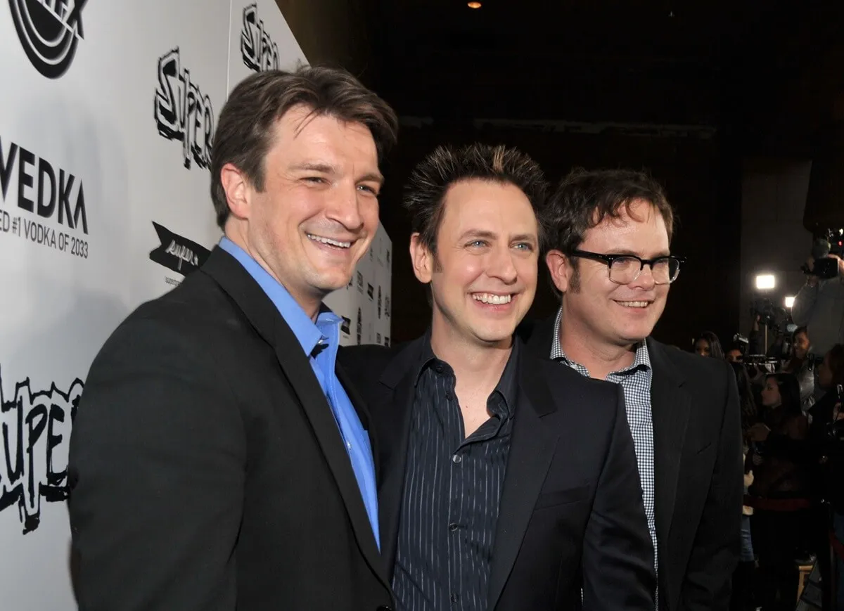 James Gunn posing with Nathan Fillion and Rainn Wilson at the premiere of 'Super'.