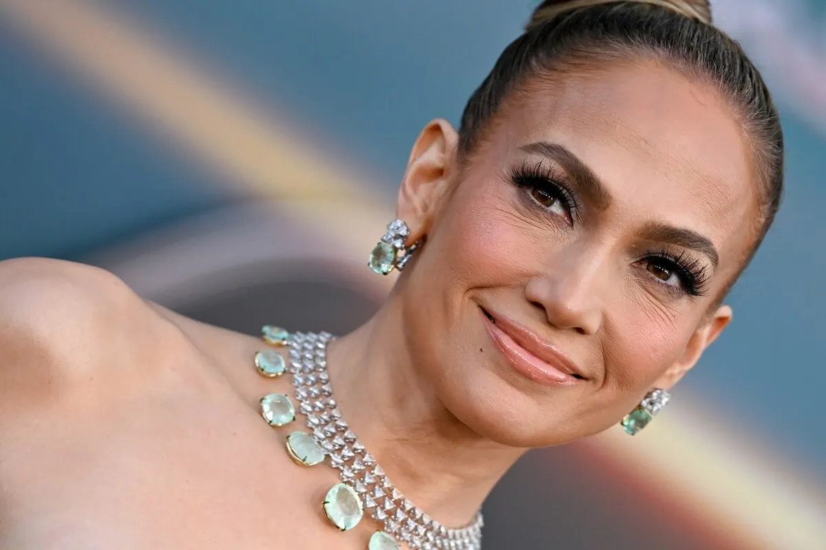 Jennifer Lopez at the premiere of 'Atlas' wearing a dress and a silver necklace.