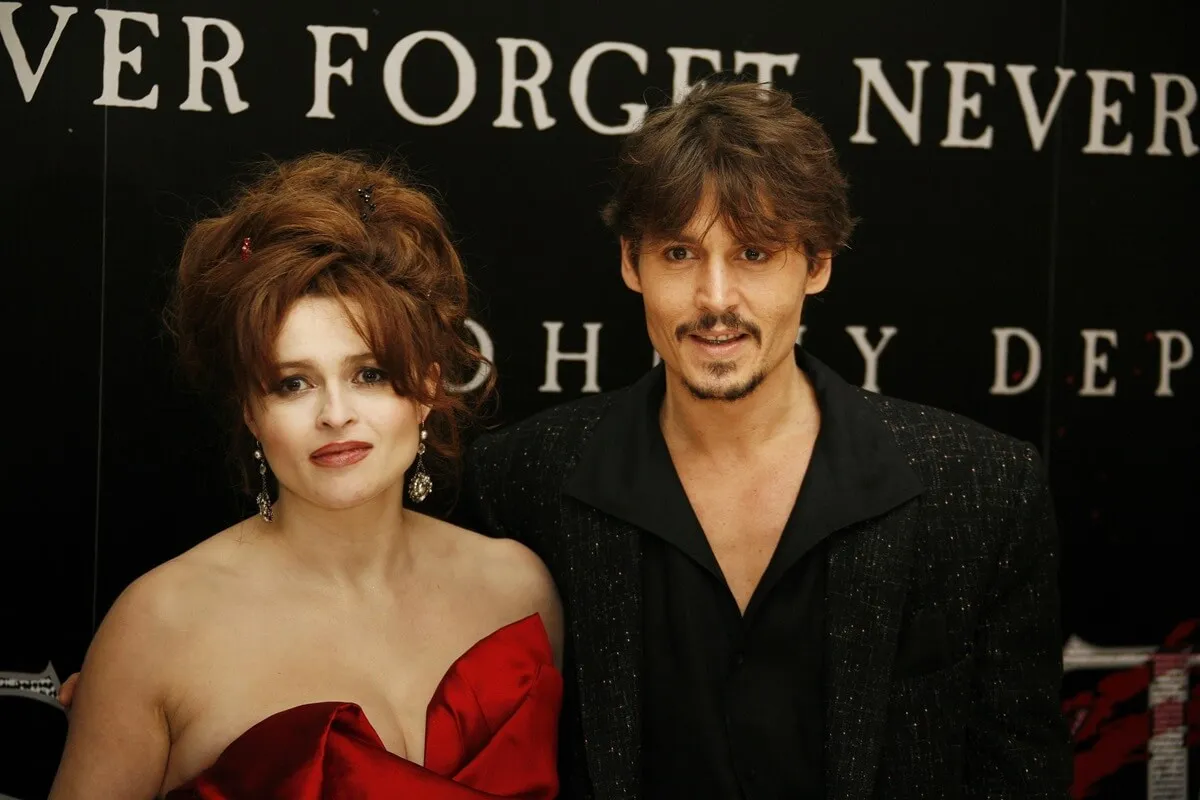 Johnny Depp and Helena Bonham Carter posing together at the premiere of 'Sweeney Todd'.