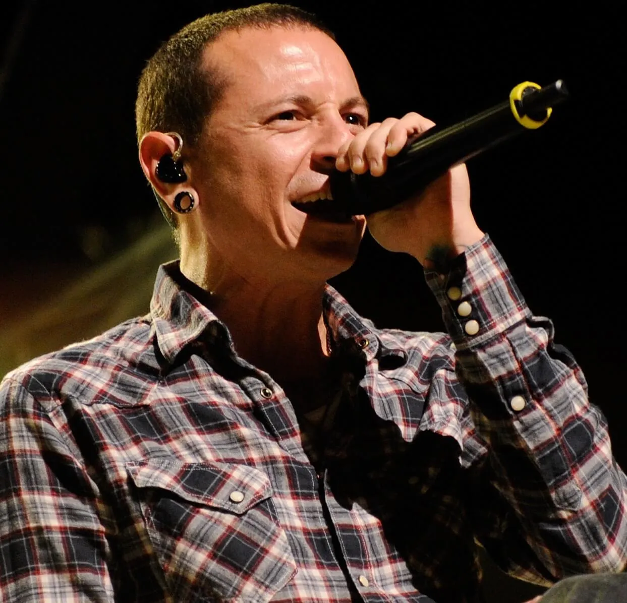 Linkin Park's Chester Bennington with a microphone