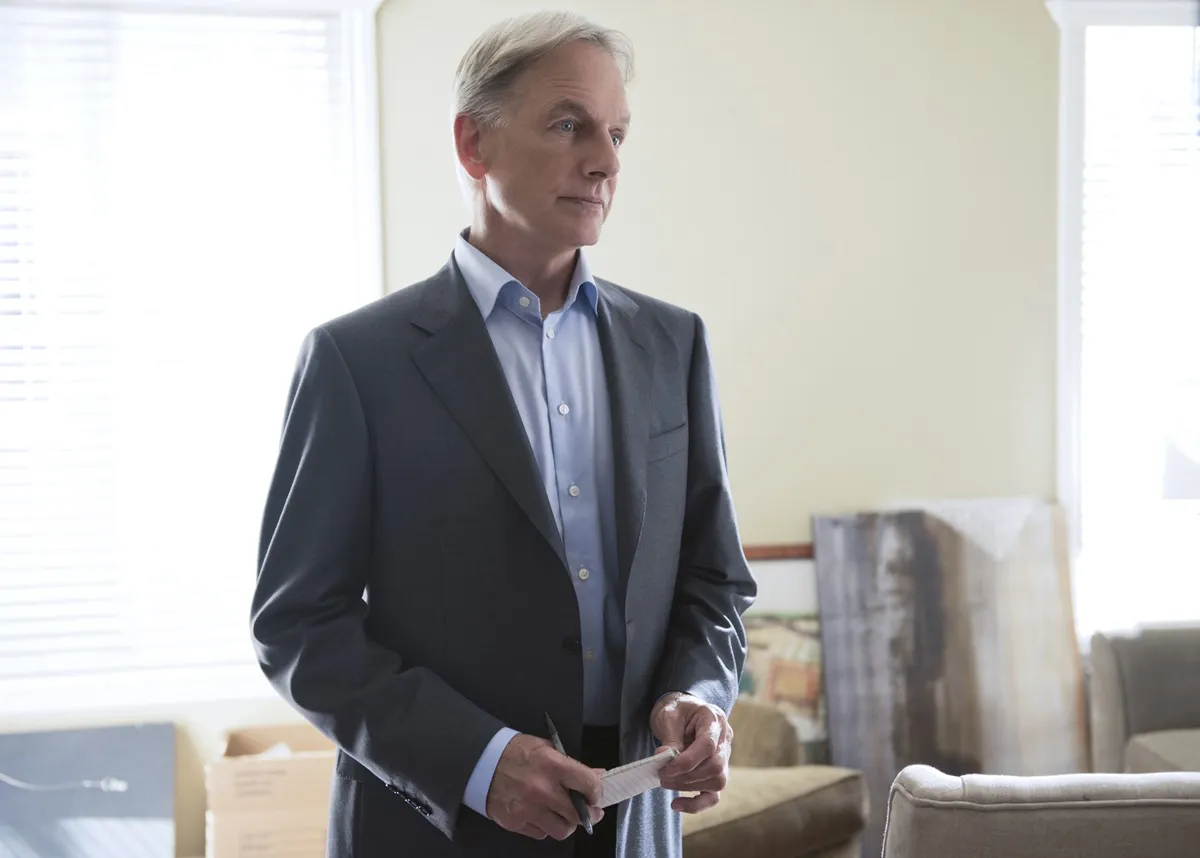 Mark Harmon posing in a suit in an episode of 'NCIS'.