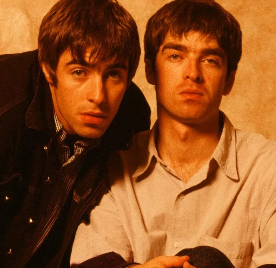 Liam Gallagher and Noel Gallagher of Oasis looking at the viewer