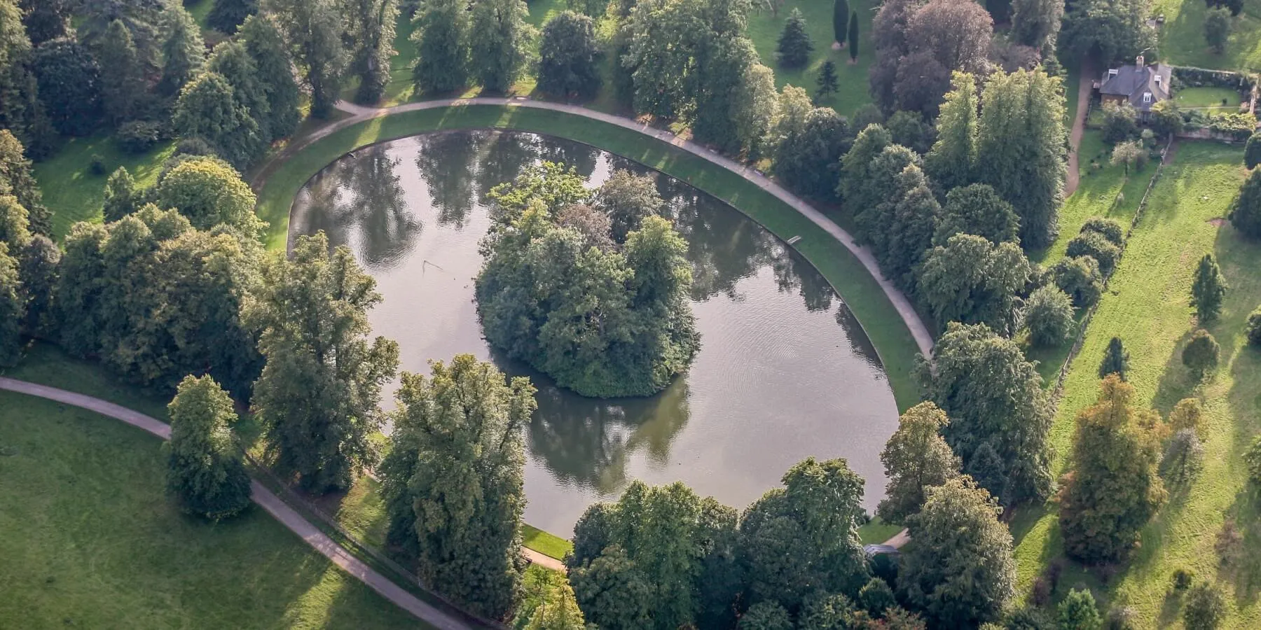 Princess Diana's grave at the center of Oval Lake at Althorp House