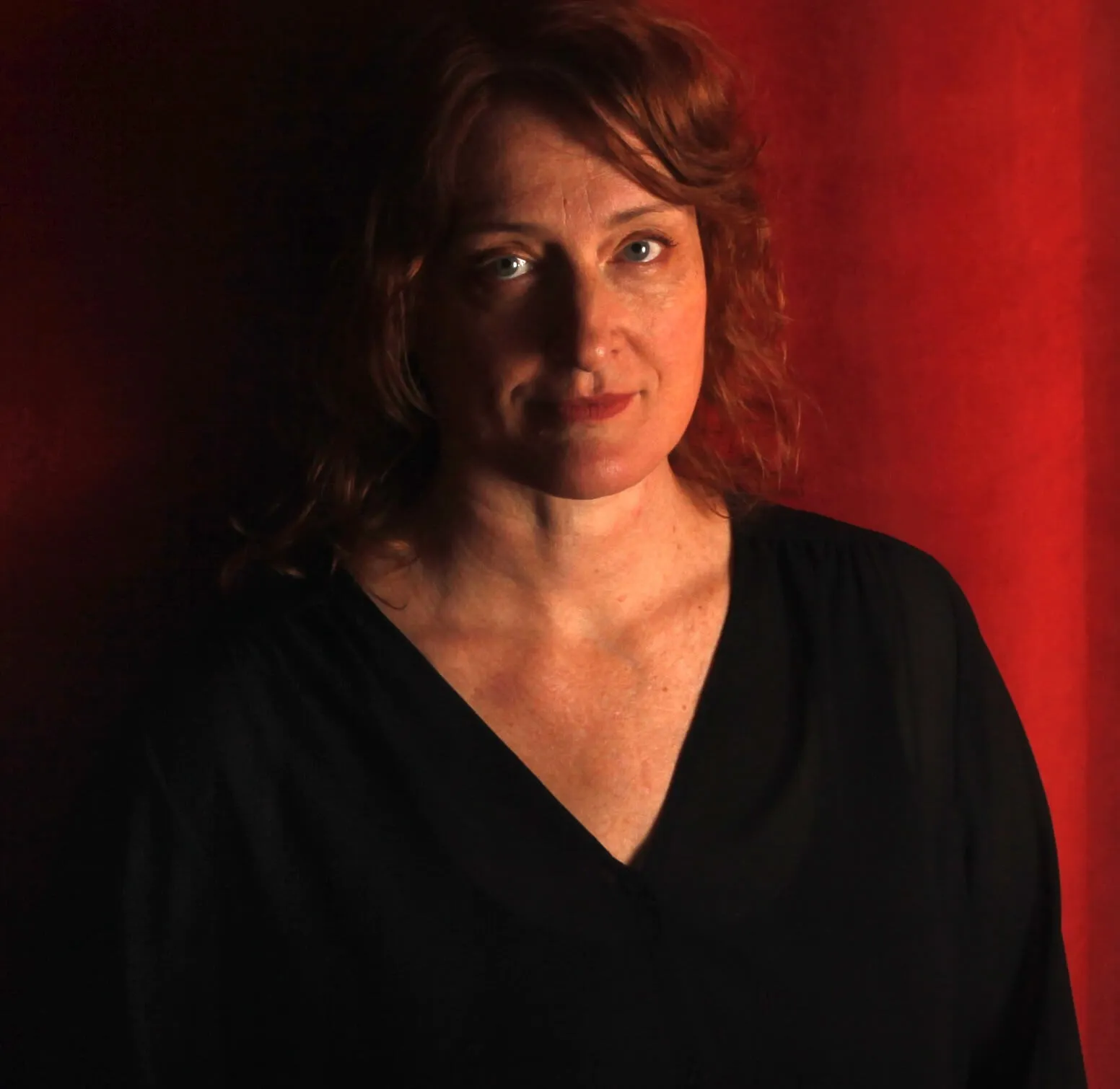 'The Babadook' director Jennifer Kent in front of a red curtain