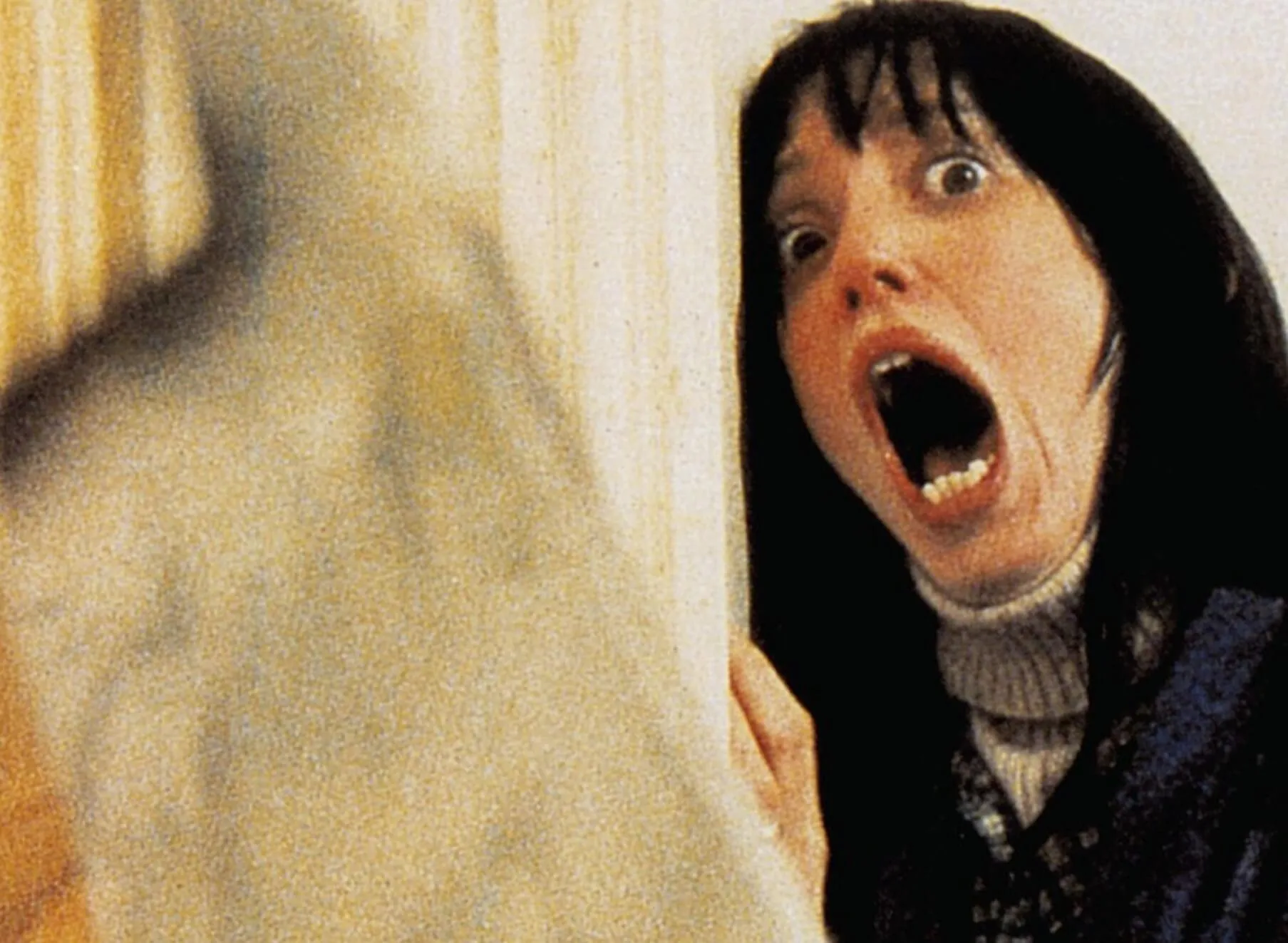 Shelley Duvall running from an axe in 'The Shining'