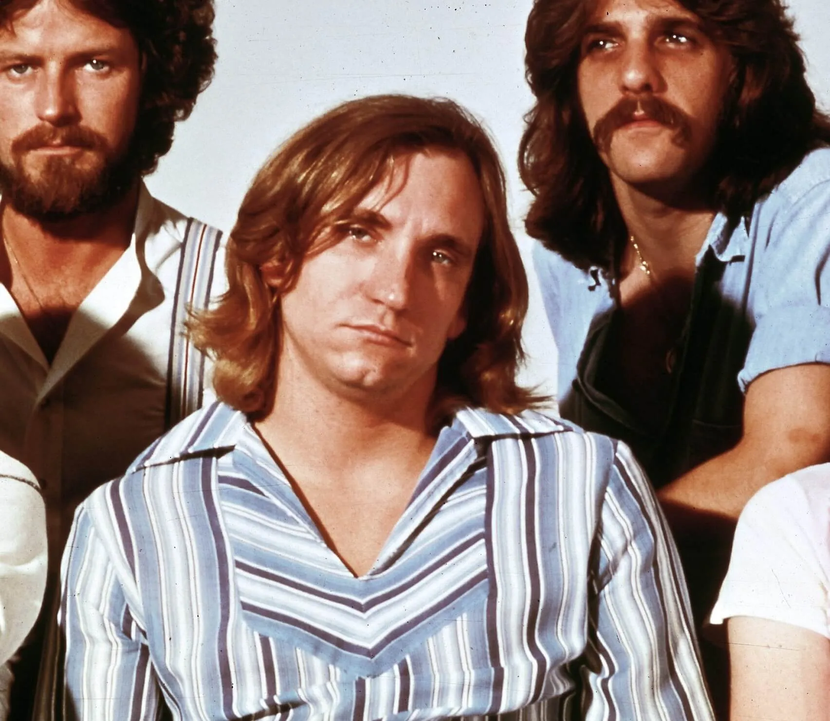 Members of The Eagles with long hair