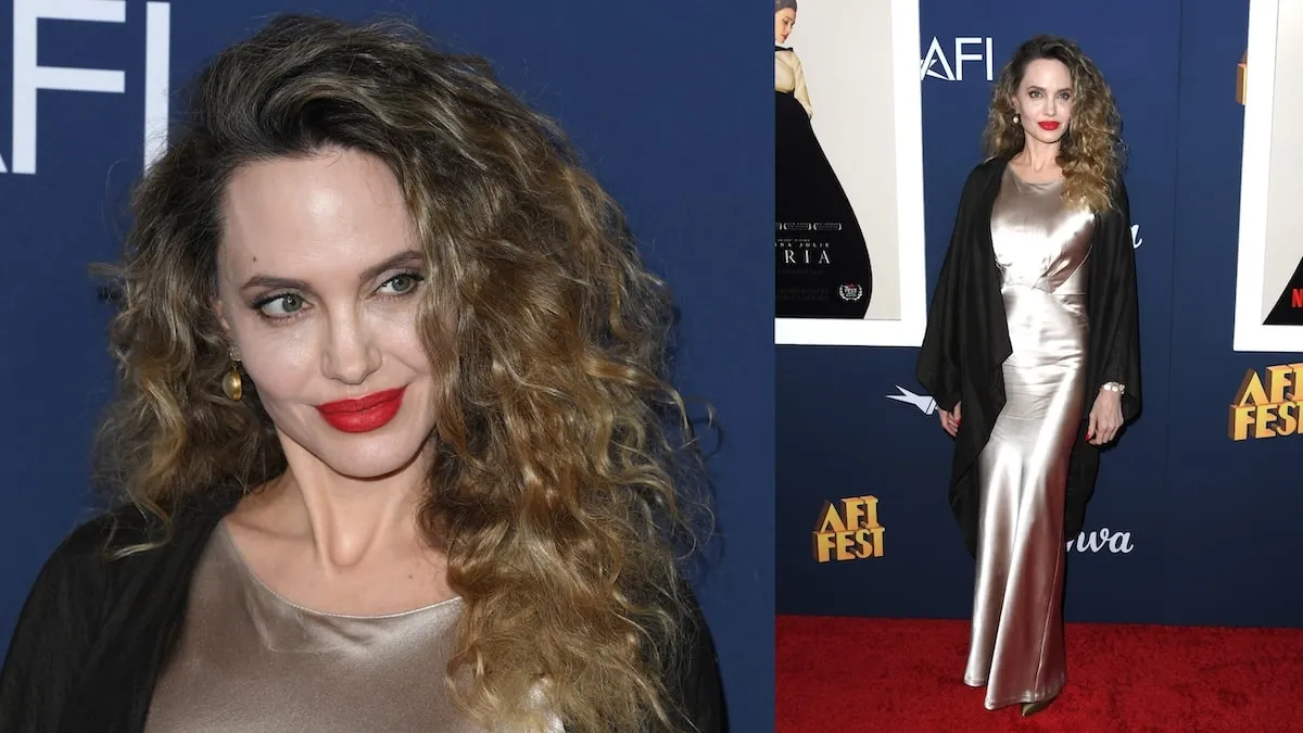 Wearing red lipstick and a curly hairstyle, Angelina Jolie smiles broadly at the 'Maria' screening at AFI Fest