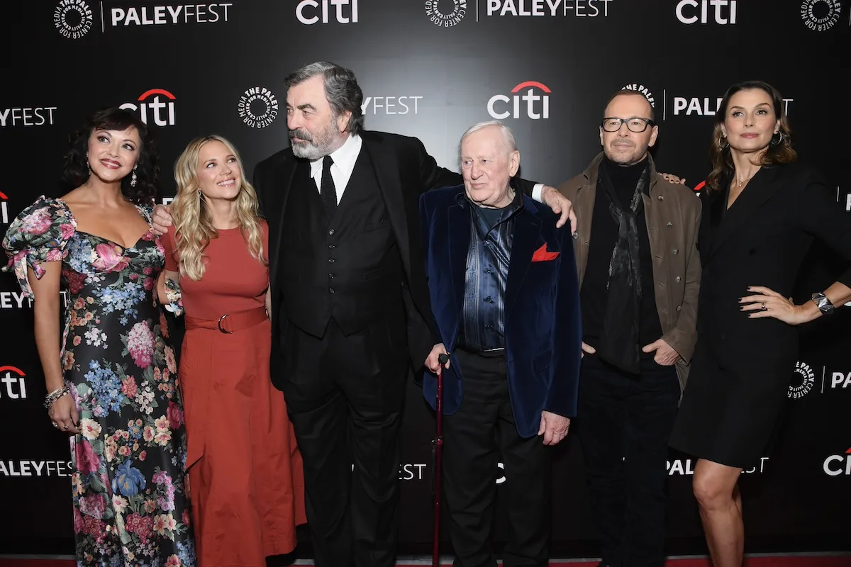 The cast of 'Blue Bloods,' including Tom Selleck, pose for a photo at PaleyFest NY 2024