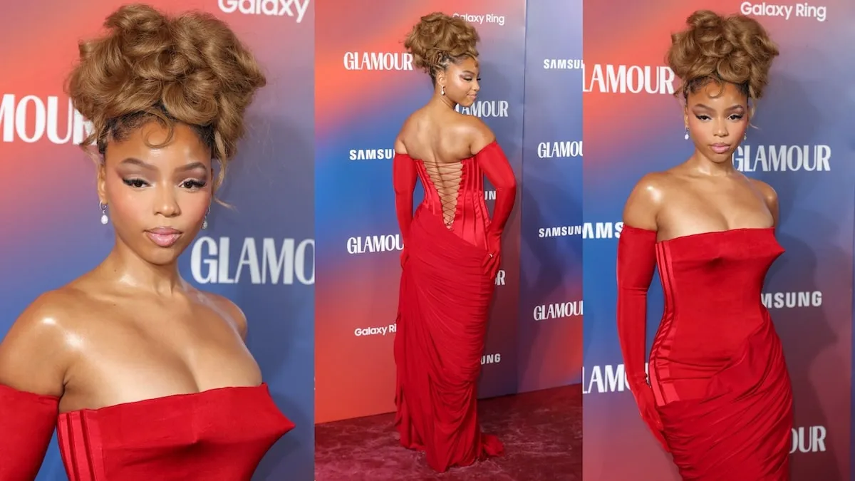 Wearing a red trumpet-style dress, Chloe Bailey poses on the red carpet at the Glamour Women of the Year Awards 2024