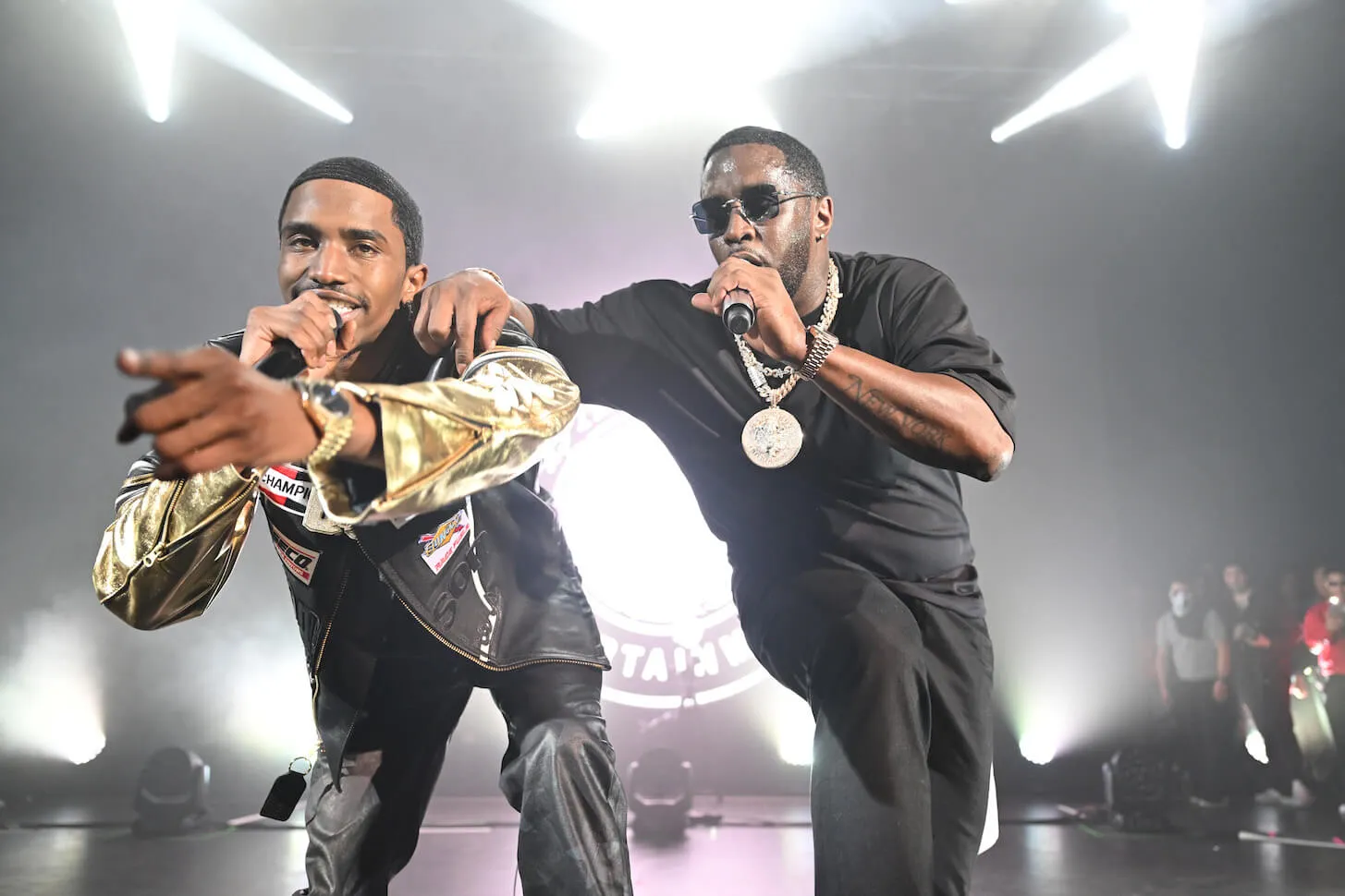 Christian 'King' Combs and Sean 'Diddy' Combs performing together on stage in 2023.