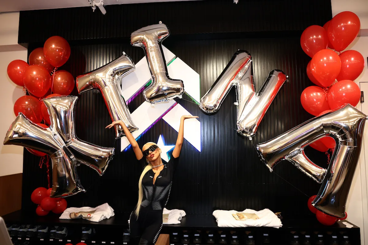 Christina Aguilera, whose focus on 'looking good' is reportedly putting a strain on her relationship with Matt Rutler, poses in front of balloons