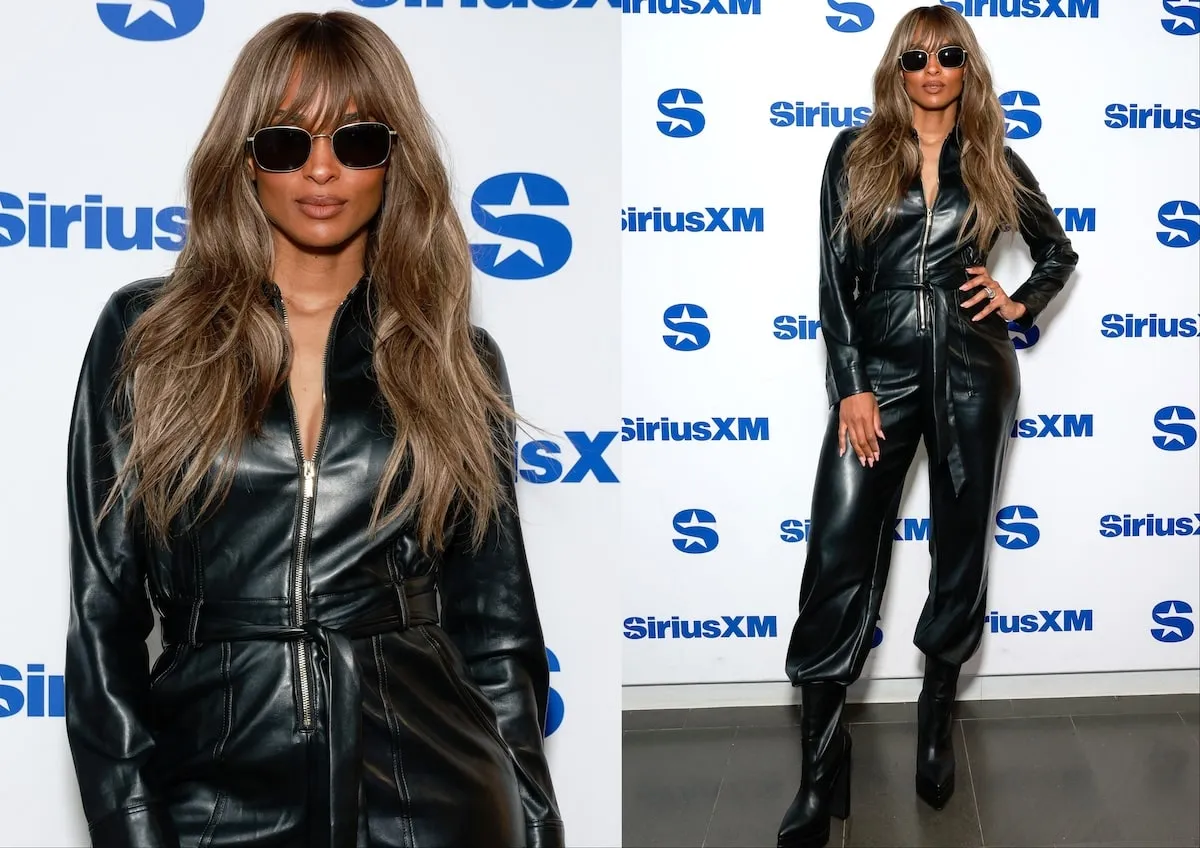 Singer Ciara wears a black leather jumpsuit and smiles at the camera as poses before her SiriusXM interview