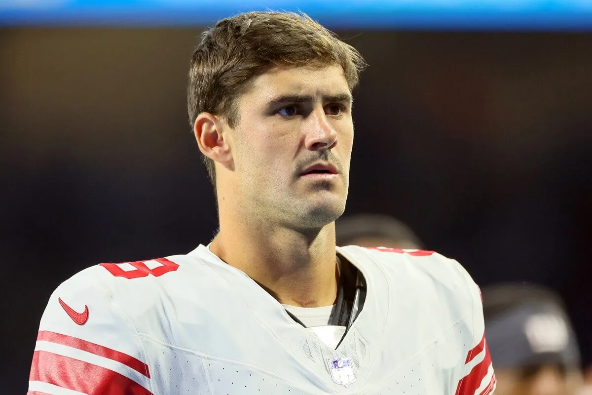 Daniel Jones of the New York Giants walks off the field at the conclusion of an NFL preseason football game opener