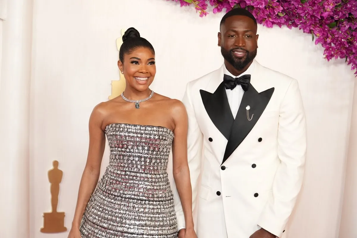 Gabrielle Union posing next to Dwyane Wade at the 96th Annual Academy Awards.